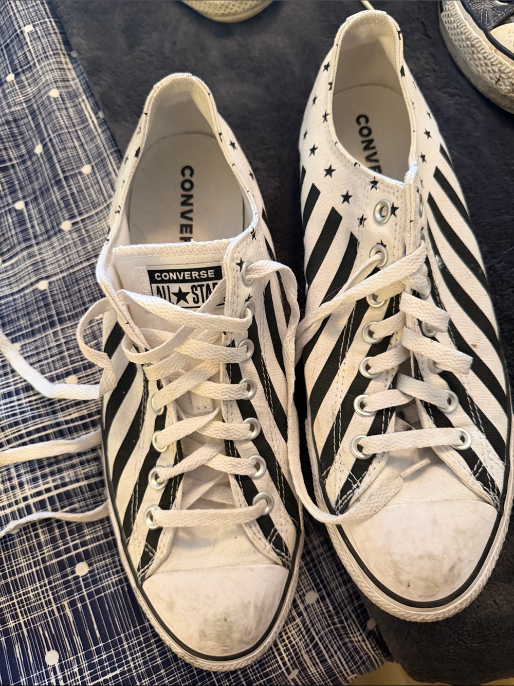 Converse White Canvas Sneakers with Black Diagonal Stripes and Star Accents